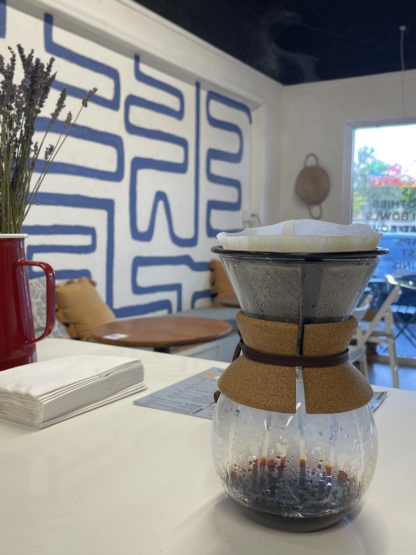 Pour-over coffee brewing at Dèlf Café — specialty coffee in Sunrise, FL