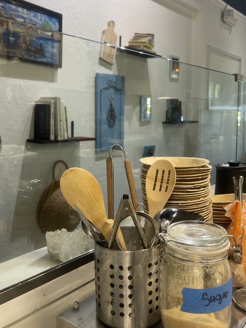 Counter and kitchen shelves at Dèlf Café — café and juice bar in Sunrise, FL